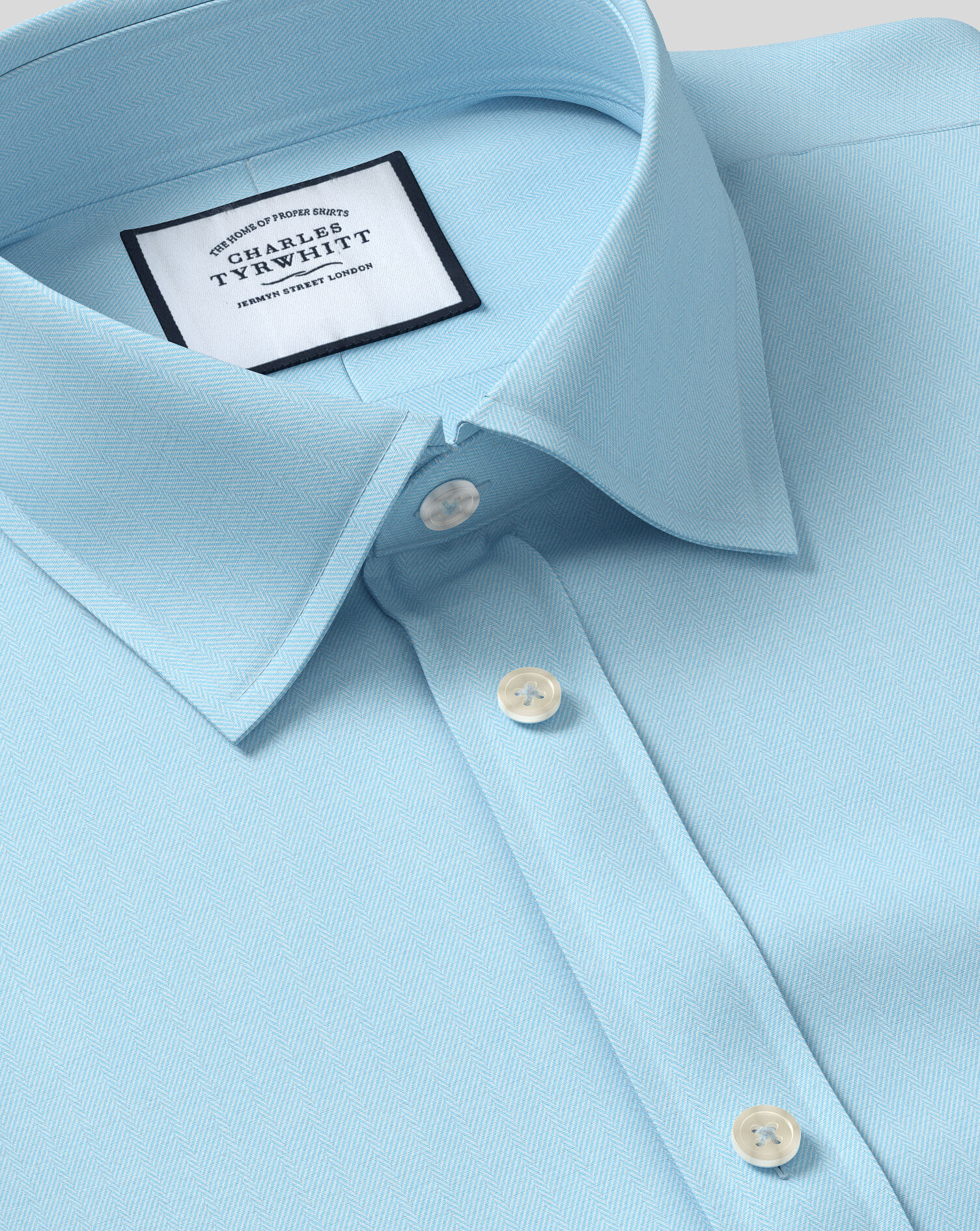 teal collared shirt
