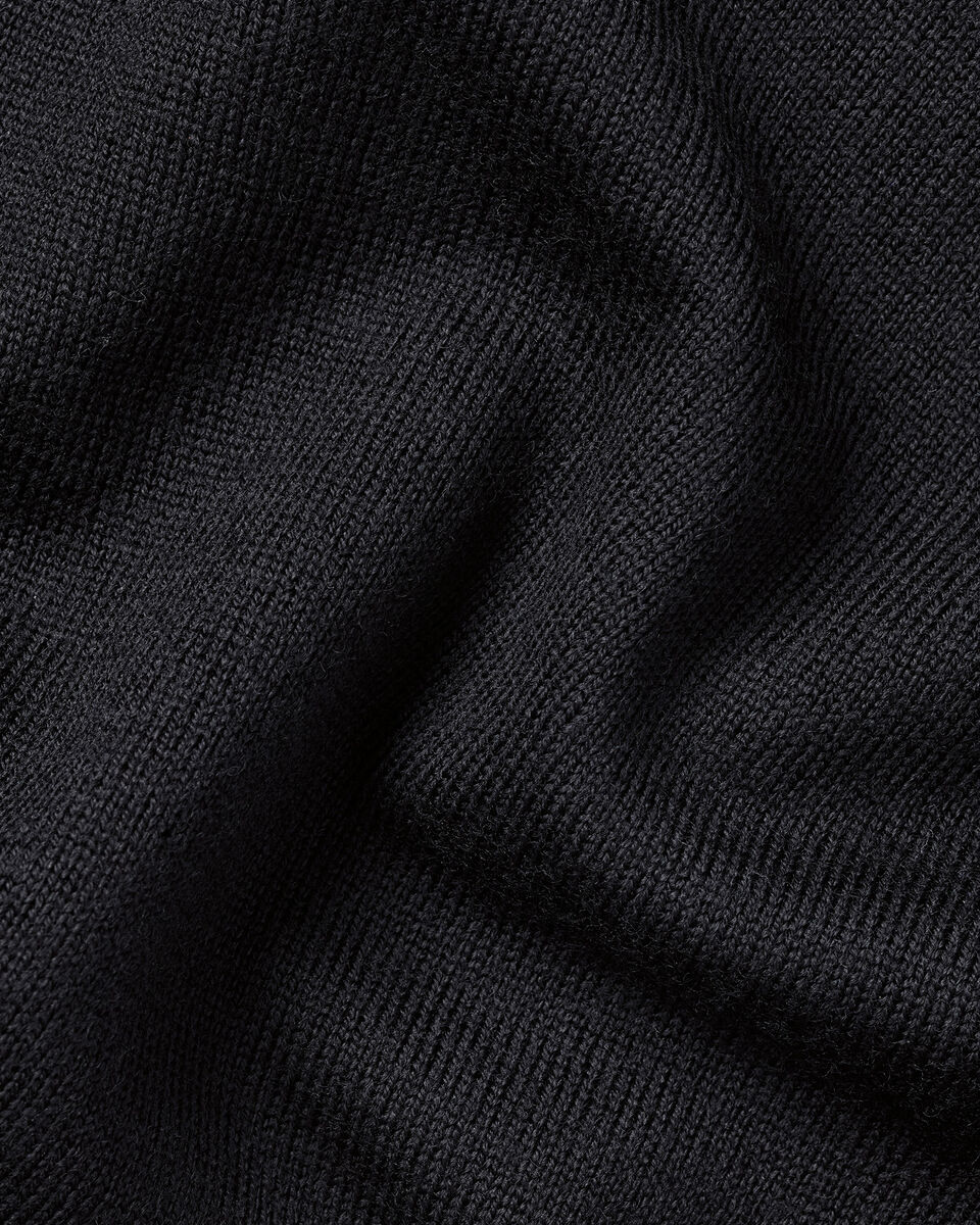 Polo &agrave; col boutonn&eacute; en pure laine m&eacute;rinos - Noir