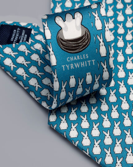 Krawatte aus Seide mit Sturz-in-den-Kaninchenbau-Motiv - Türkisblau