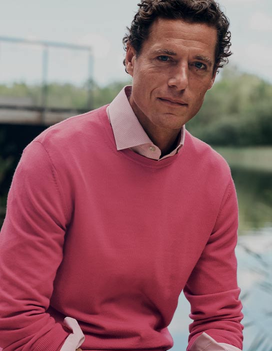 Man in pink jumper